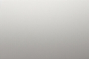 マットグレーの滑らかなプラスチックの表面に細かい質感があり、右側にビネットが付いています。絶妙なテクスチャ背景、柔らかい空白の背景	