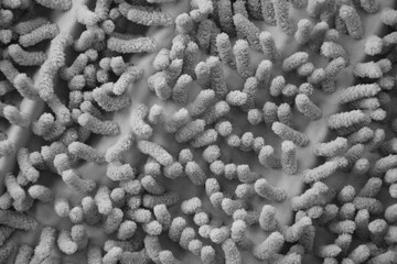 Processed image of fluffy gray doormat from bathroom in grey color