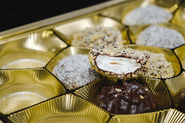 A bitten marshmallow with a dissatisfied anthropomorphic face. Pareidolia. Angry grimace. The...