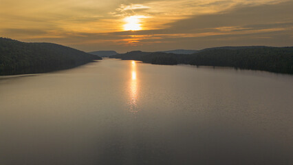 Sunset over a magnificent fishing lake in the Canadian forest