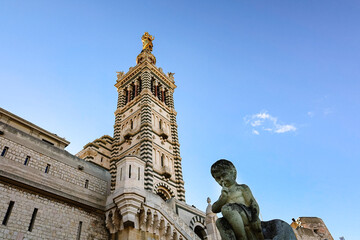 View of Notre Dame de la Garde on top of hill in Marseille. Basilica of Our Lady of Guard with...