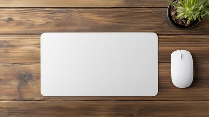 White Mouse Pad and Mouse on Wooden Desk