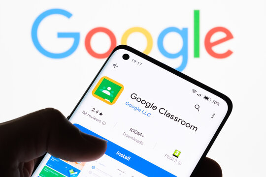 Smartphone screen displaying Google Classroom app with Google logo in the background, highlighting the connection between Google Classroom and Google