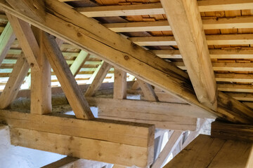 Detail of the wooden beams of a rural roof.