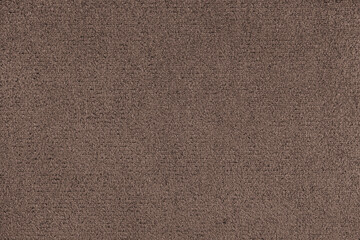 Plain brown colored microfiber detail texture, suede leather structure, textile background