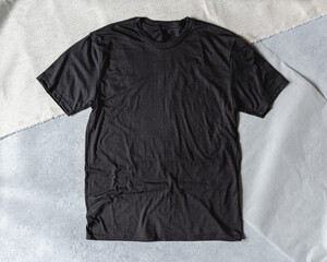 Black Shirt Flat Lay Mock Up on Concrete Background