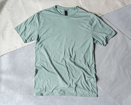 Sage Green Shirt Flat Lay Mock Up on Concrete Background