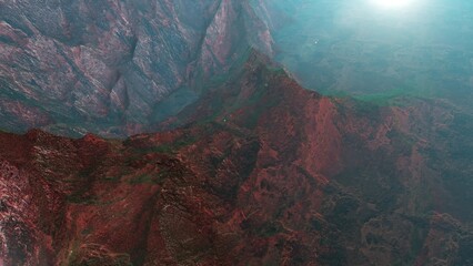 Majestic Rocky Landscape Under Bright Blue Sky in Early Morning Light