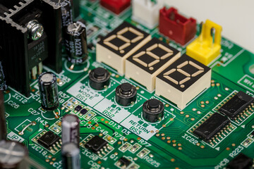 Digital numbers on circuit board.