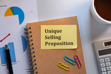 There is sticky note with the word Unique Selling Proposition. It is as an eye-catching image.