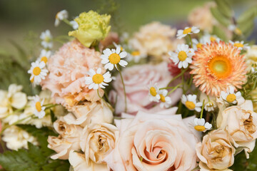 Close-Up of Elegant Floral Bouquet with Roses, Daisies, and Gerberas