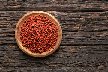 Bixa Orellana - Organic red annatto seeds in the bowl