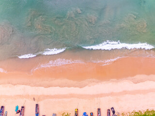 Beautiful sea beach and waves texture in sunny summer day background