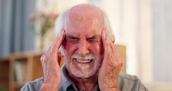 Headache, senior man and stress in living room with pain for dementia, anxiety or confused in retirement home. Migraine, pensioner and elderly person massage temple for vertigo, dizzy or remember