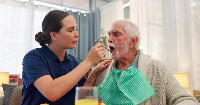 Old man, nurse and feeding patient with healthcare, assist and nutrition in elder home. Professional, caregiver and senior person with support, empathy and nursing with rehabilitation, help and food