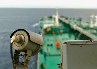 CCTV camera and a merchant ship underway at sea
