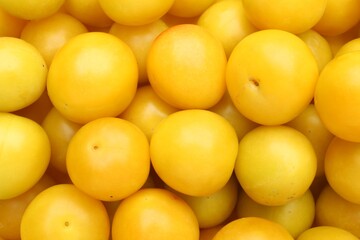 Many fresh plums as background, top view