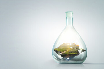 Landscape with mountain inside glass bottle