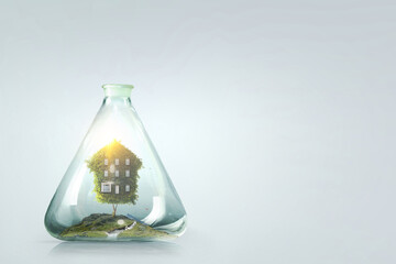 House inside a floating glass bottle
