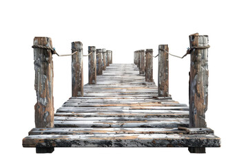 Naklejka premium A wooden bridge with a rope hanging from it