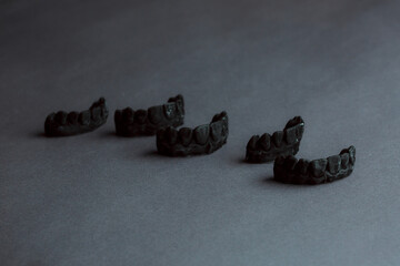 Dental prosthetics laboratory concept. Human teeth dentures for 3d modeling. Jaw dental bridge 3D...