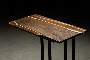 Expensive vintage furniture. The table is covered with epoxy resin and varnished. Luxury quality...