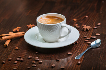 cup of coffee on wooden table
