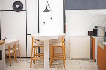 stylish light interior of a cafe in a supermarket. Trends and fashion in interior