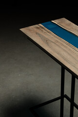 Expensive vintage furniture. The table is covered with epoxy resin and varnished. Luxury quality...