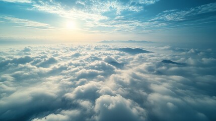 Looking down from the mountaintop, the stunning sea of clouds captures the tranquility and extraordinary beauty of nature, showcasing the vastness and magnificence of the mountain landscape.