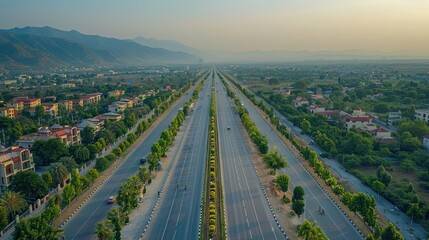 Aerial View of a Highway in a Mountainous Landscape