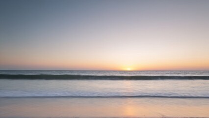  the sun setting in the sunset on the beach by the sea,