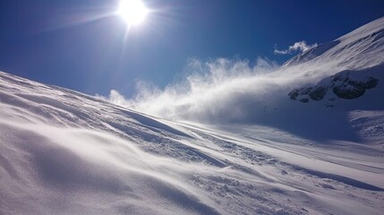 Snow-Covered Mountain Slope with Windblown Snow and Bright Sun