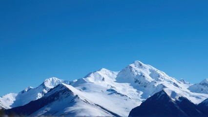 Obraz premium a person climbing down a snow covered slope on top of mountain,
