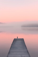 Fototapeta premium Tranquil Dawn by the Lake: A Journey into Solitude and Reflection in Nature's Embrace