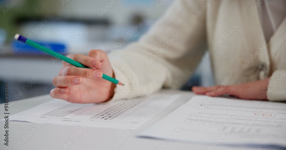 Poster Education, exam and hands at desk with paper, test and multiple choice assessment at school. Student, person or writing on document for answer, quiz or questionnaire in class for learning evaluation