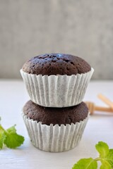 Coffee break chocolate cupcake on white background