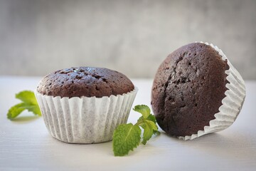 Coffee break chocolate cupcake on white background