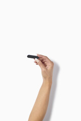 White woman manicured hand with nail files polish Makeup isolated on white background. Makeup and Nail art manicure concept. Top view. Female hand model. - photo