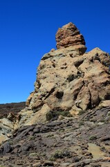 Scenic view of volcanic rock formations in desert during sunny day, Teide National Park, Tenerife