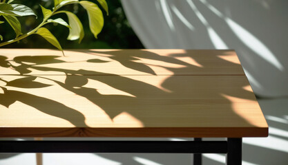Minimalist Wooden Table with Plant Shadows in Sunlight