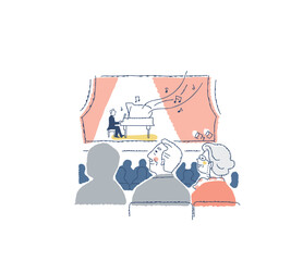 ピアノリサイタルを鑑賞しているシニア夫婦