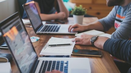 Describe the role of laptops in supporting continuous professional development and learning in office environments.