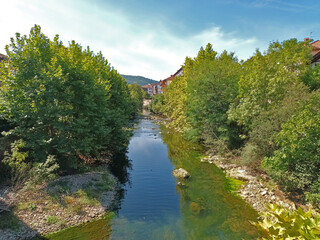 the Bidasoa river as it passes through Elizondo, Navarra, one of the most beautiful towns in Spain, tourist destination,