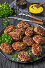 frikadeller, danish meatballs on a plate, top view