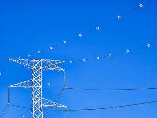Row of High Voltage Electrical Towers in the Andes of South America