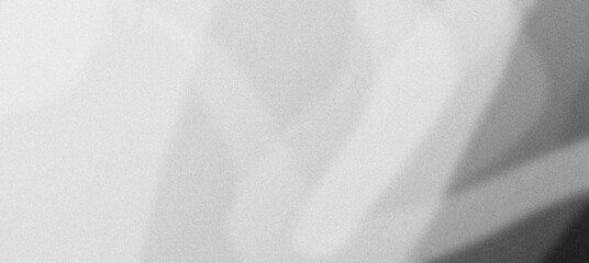 Obraz premium Grainy texture background with abstract light and shadow play creating a subtle and elegant design