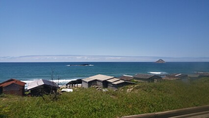 view of the sea from the beach at japan