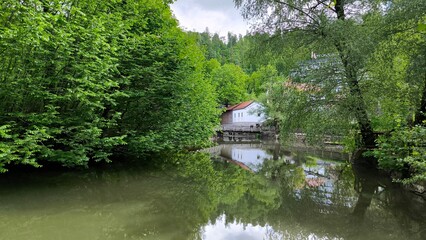 landscape by the Pivka river in spring in Postojna village, Slovenia