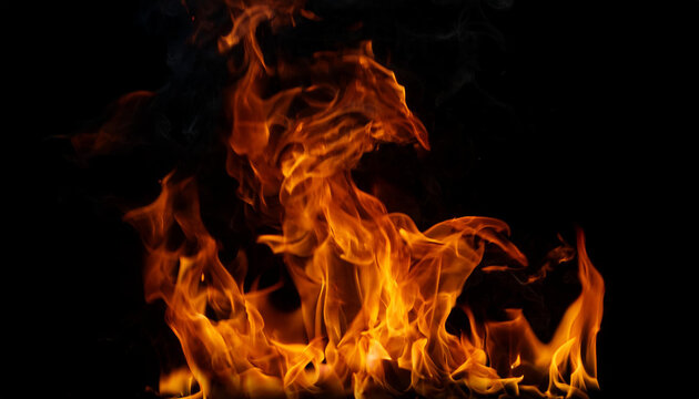 ire burns, waving back and forth by the wind at night on a black